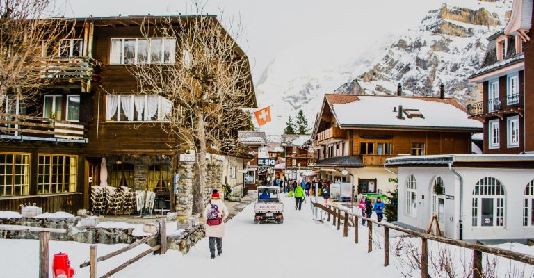 main street with shops and snow on the ground